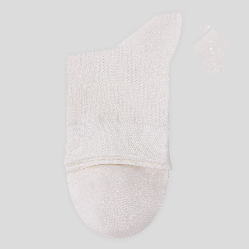 Chaussettes mi-mollet en maille de coton de couleur unie (7 paires)