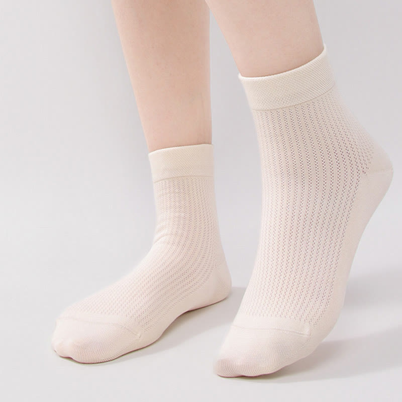 Chaussettes mi-mollet en maille de coton de couleur unie (7 paires)