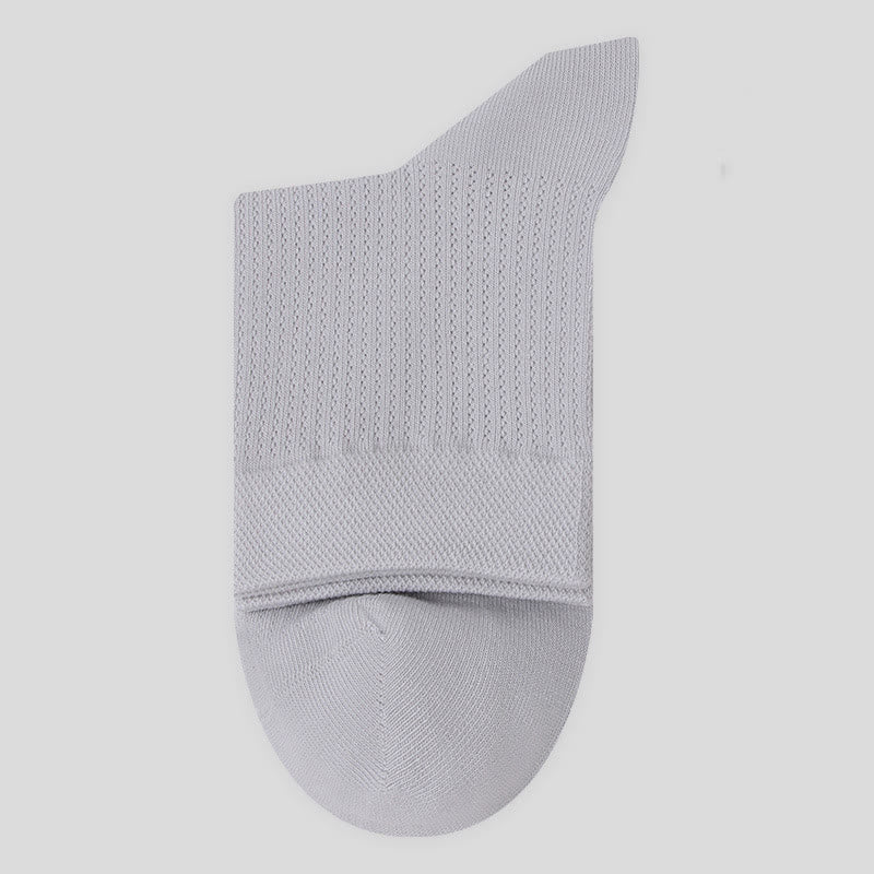 Chaussettes mi-mollet en maille de coton de couleur unie (7 paires)