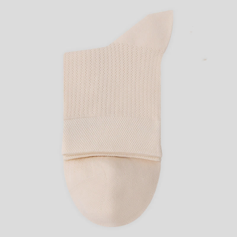 Chaussettes mi-mollet en maille de coton de couleur unie (7 paires)