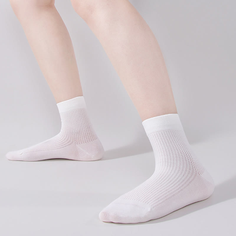 Chaussettes mi-mollet en maille de coton de couleur unie (7 paires)