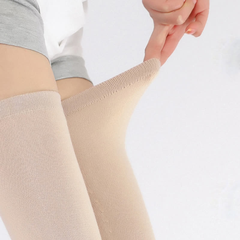 Manches de cuisse élastiques en tricot fin de couleur unie