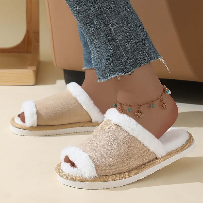 Chaussons en daim avec bordure en fourrure
