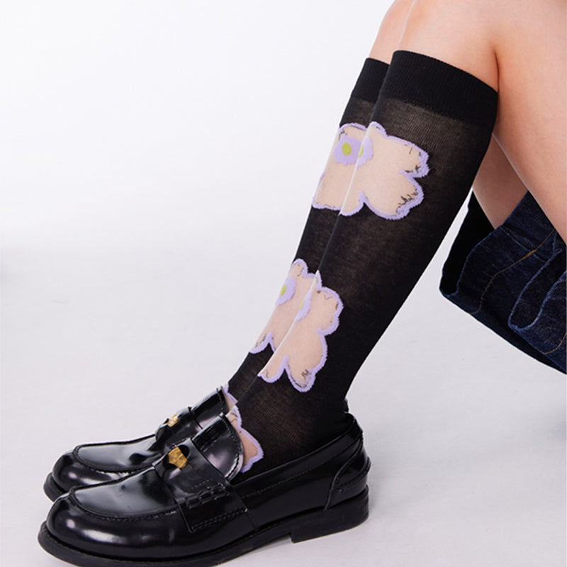 Chaussettes transparentes en verre à motif floral violet - image 1