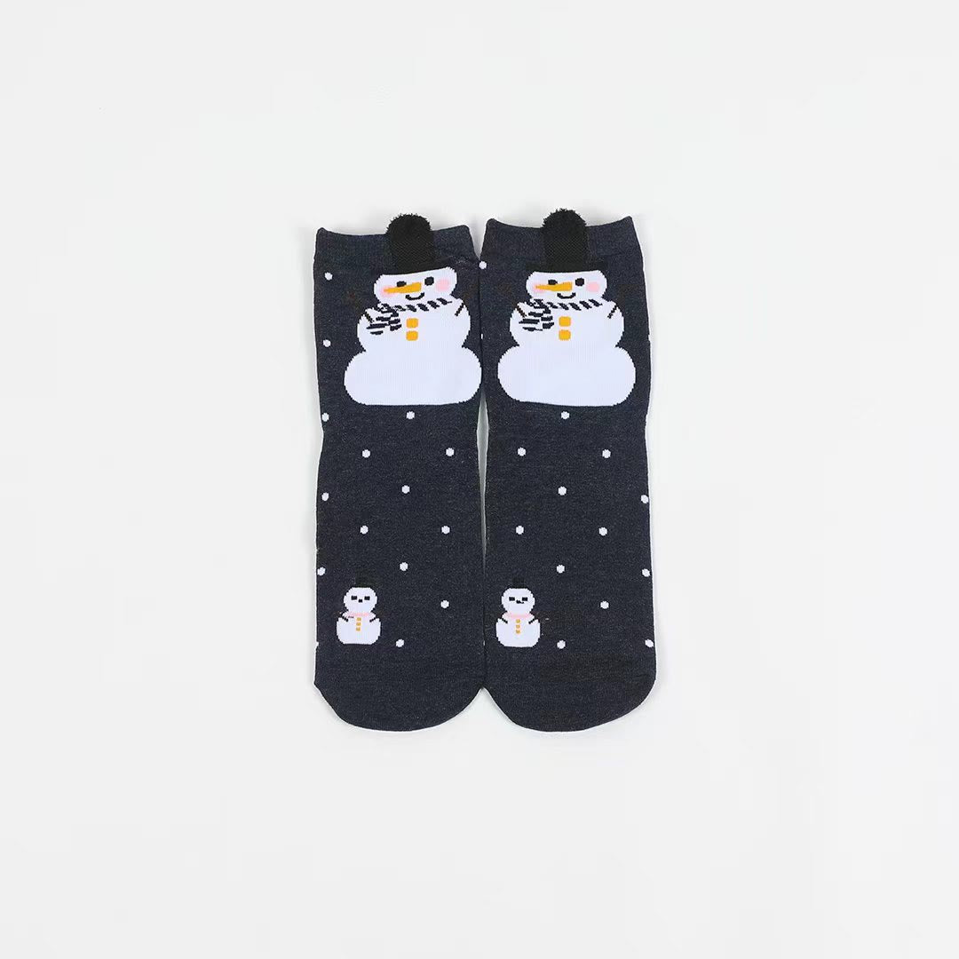 Chaussettes à pois et flocons de neige
