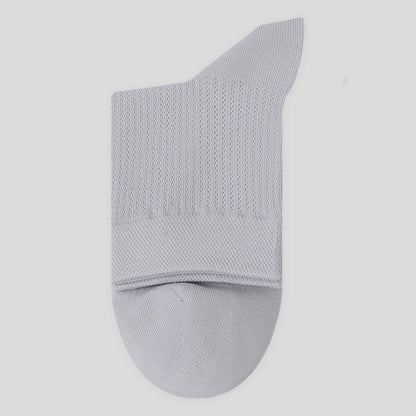 Chaussettes mi-mollet en maille de coton de couleur unie (7 paires)