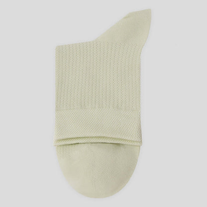 Chaussettes mi-mollet en maille de coton de couleur unie (7 paires)