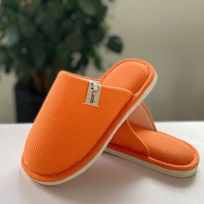 Chaussons simples gaufrés de couleur unie