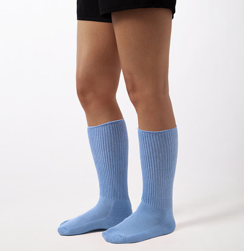 Chaussettes hautes en maille respirante