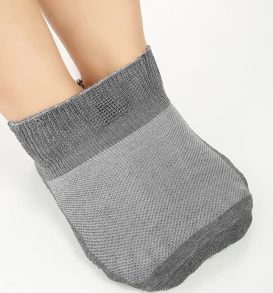 Chaussettes respirantes en maille extensible de couleur unie (2 paires)