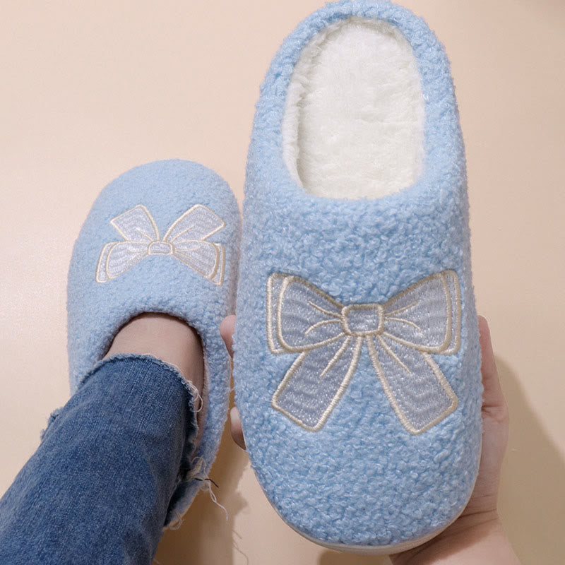 Chaussons bleus à nœud grande taille - image 1