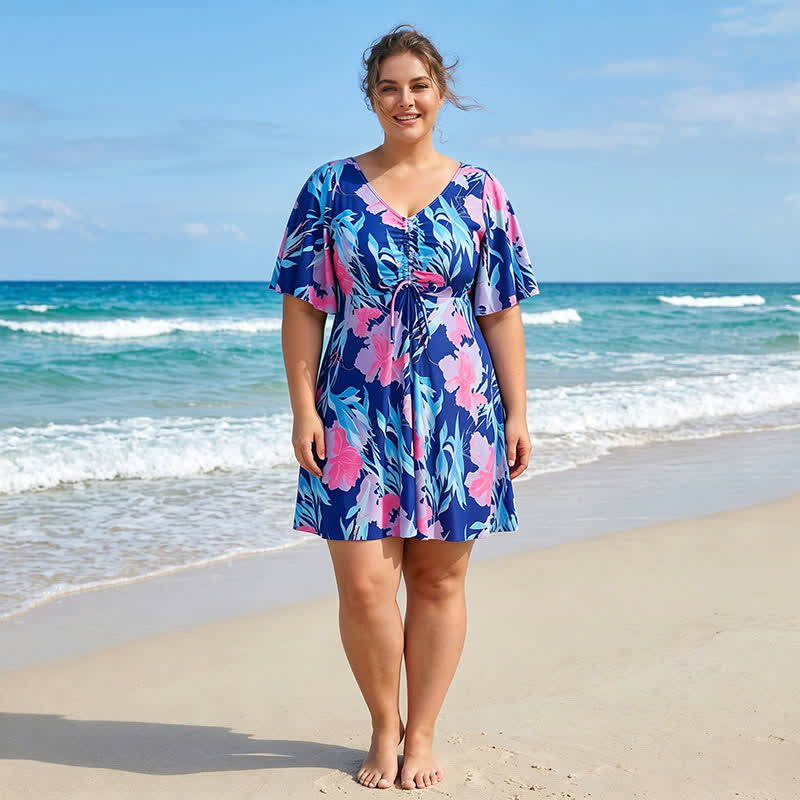 Maillot de bain bleu tropical à fleurs et col en V - image 1