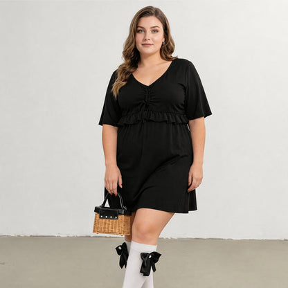 Maillot de bain noir à manches en résille et volants - image 1