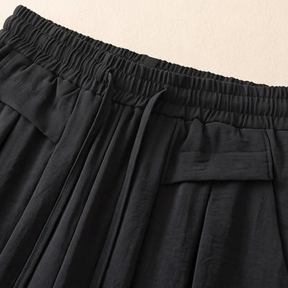 Pantalon décontracté à jambes larges et extensibles - image 7