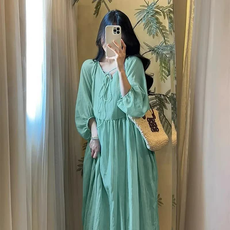 Robe maxi fluide en Tencel à col noué - image 4