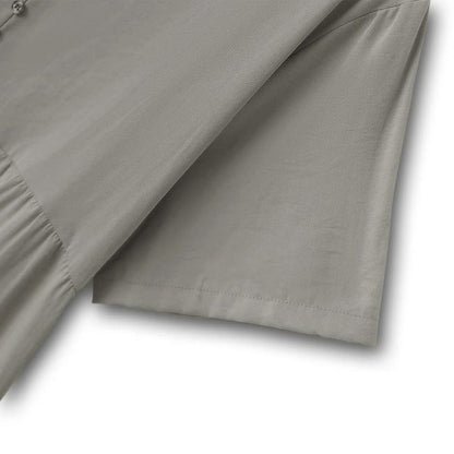 Robe midi fluide à col en V et boutons - image 4