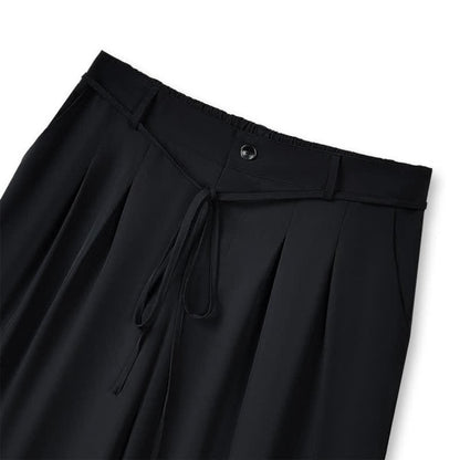 Pantalon noir à jambes larges et cordon de serrage - image 1