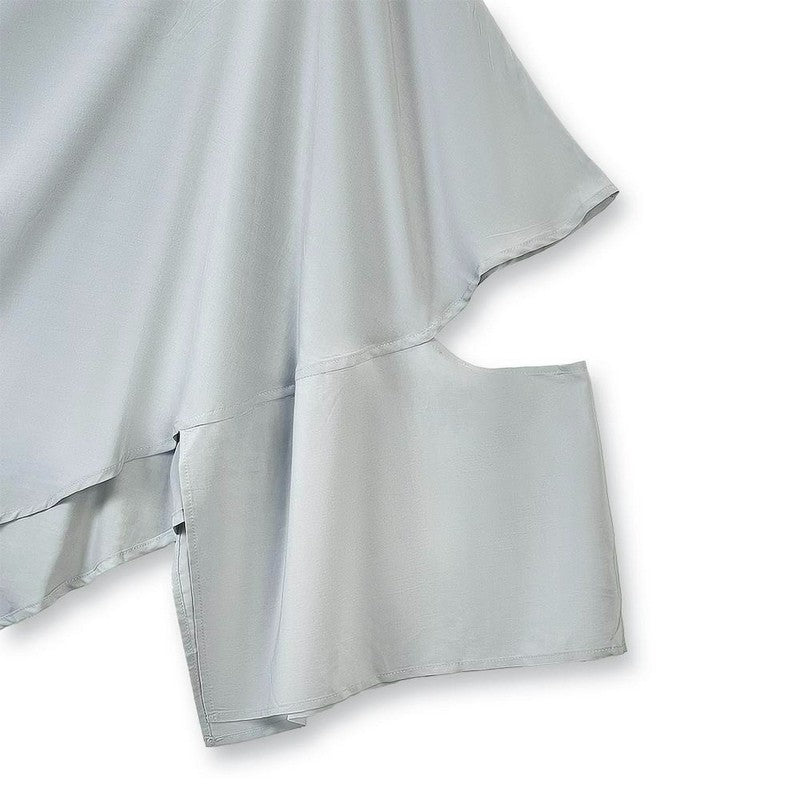 Ensemble deux pièces composé d'un haut asymétrique drapé et d'une jupe midi plissée. - image 5