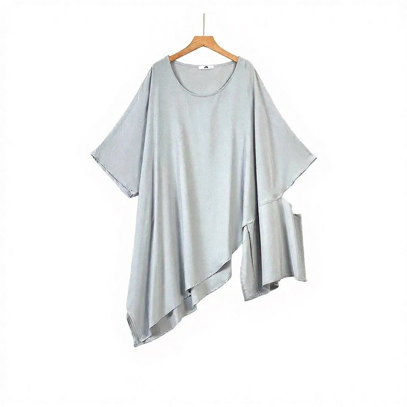 Ensemble deux pièces composé d'un haut asymétrique drapé et d'une jupe midi plissée. - image 1